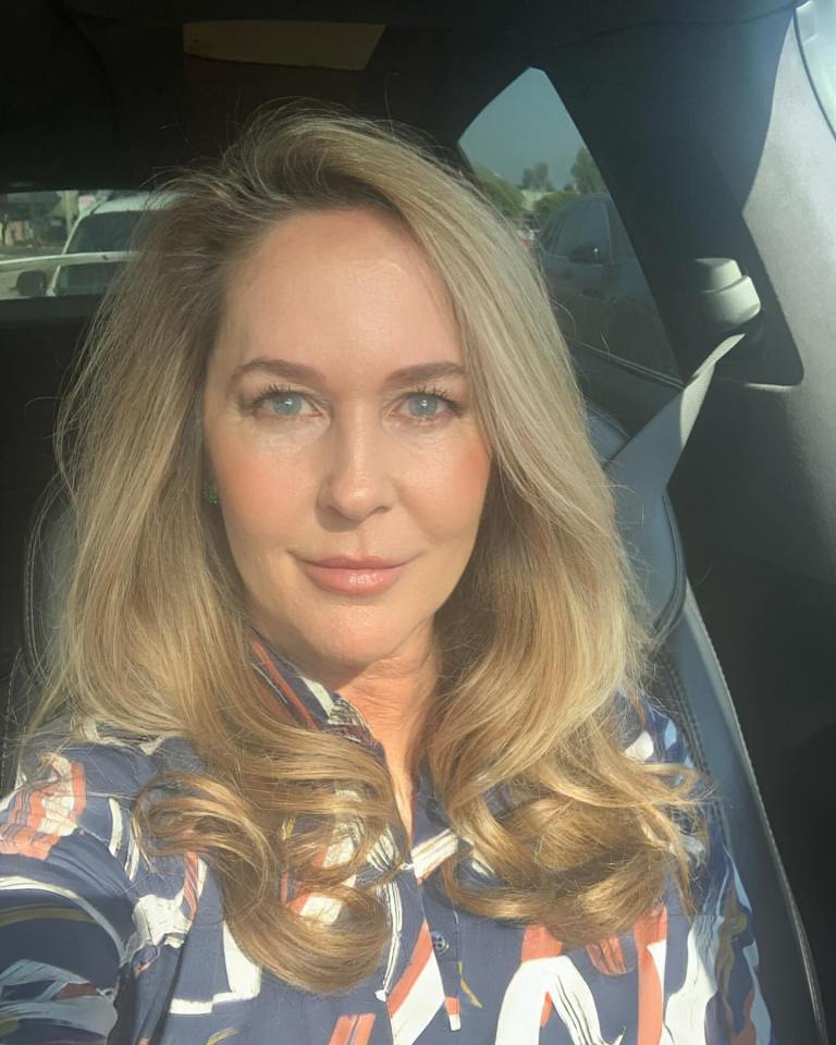 Selfie of Erin Murphy, star of a 60s TV show, in a car.