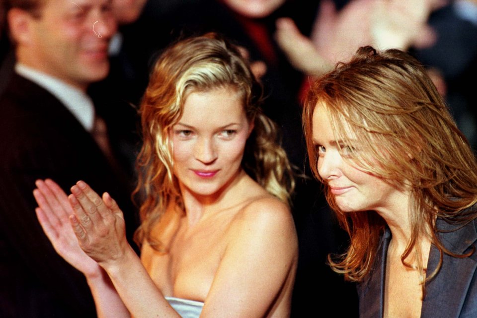 Kate Moss and Stella McCartney at a fashion show.