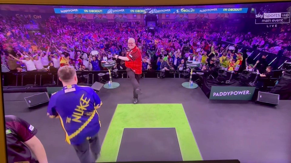 Stephen Bunting hilariously kicked out towards Luke Littler