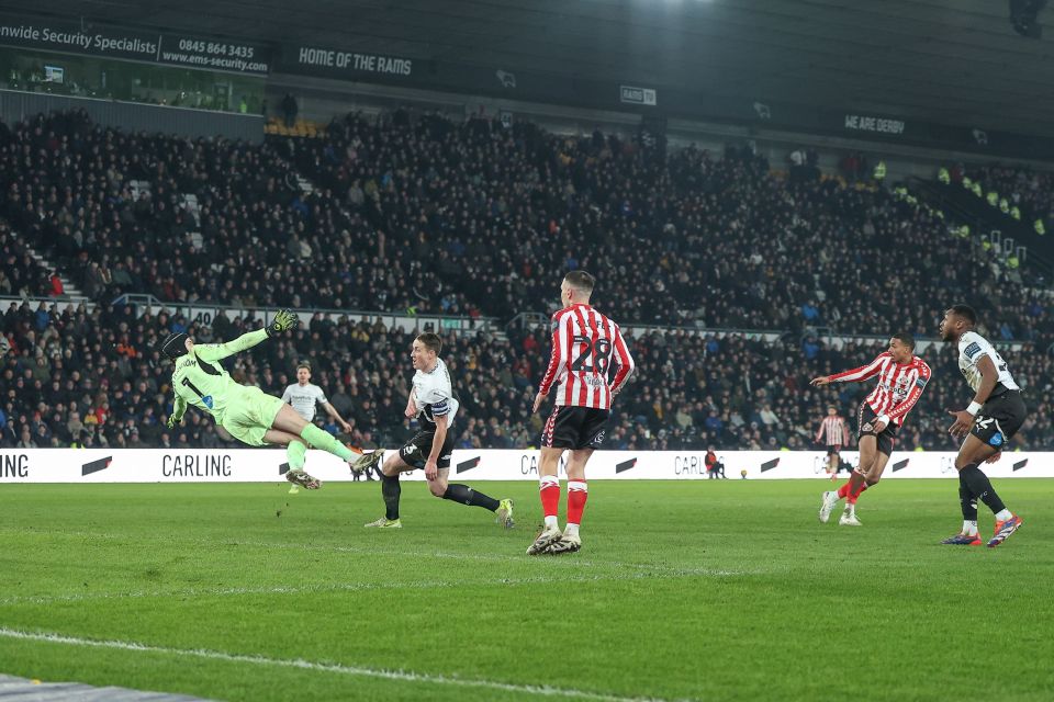 Soccer player scoring a goal during a game.