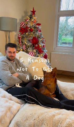 Man and dog sitting on a couch in front of a Christmas tree; text overlay: 5 Reasons Not To Get A Dog.