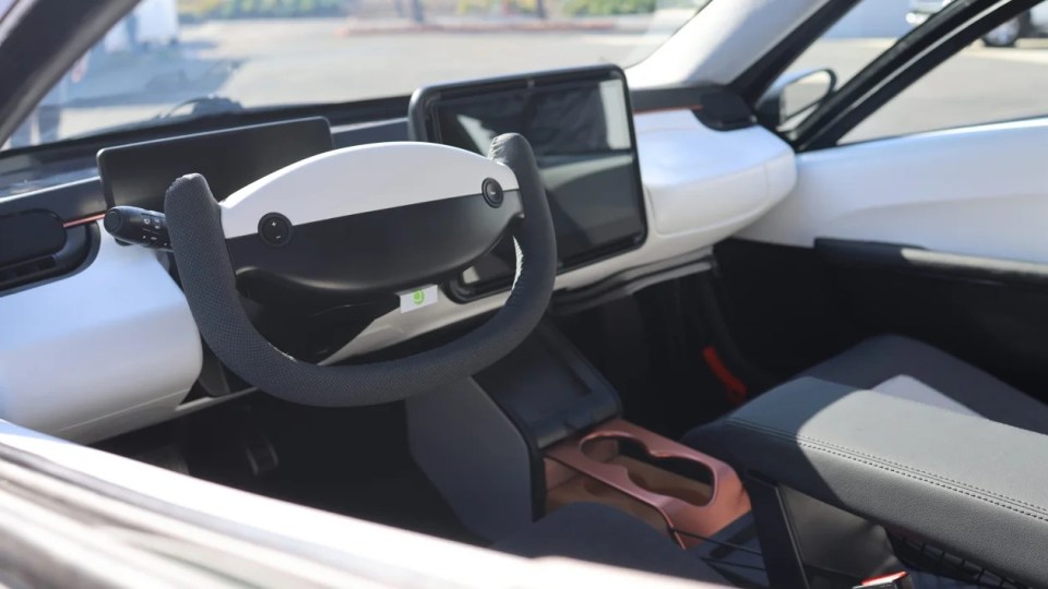 Interior of a three-wheeled solar-powered car.