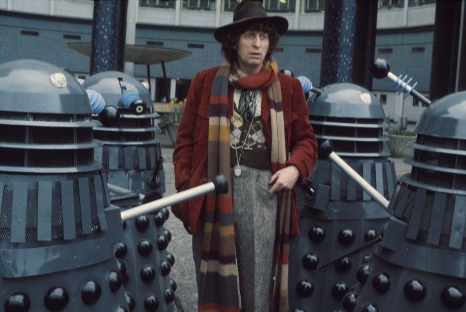 Tom Baker as the Doctor with Daleks.