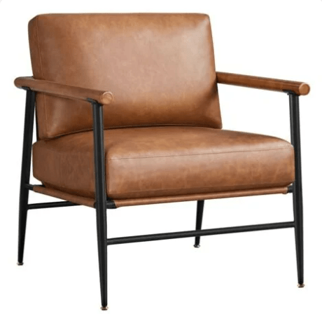 Tan leather accent chair with black metal legs.