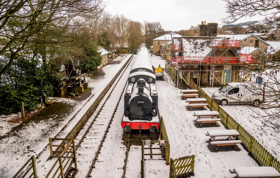 A train covered in snow at the Dales Countryside Museum in Hawes, North Yorkshire