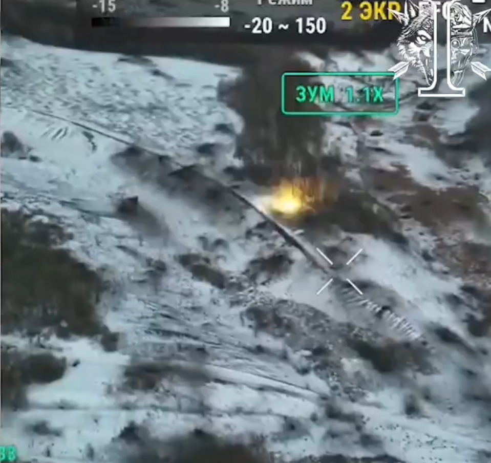 Aerial view of an explosion in a snowy landscape.