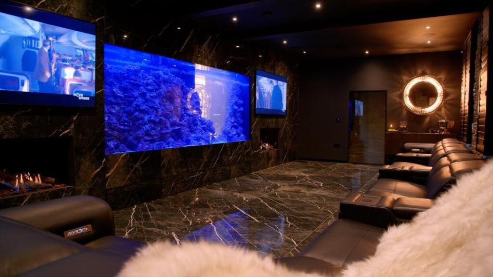 The home also features a hidden entertainment area, complete with an aquarium