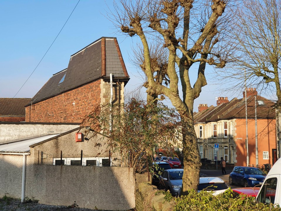 Unusually designed house on a residential street.