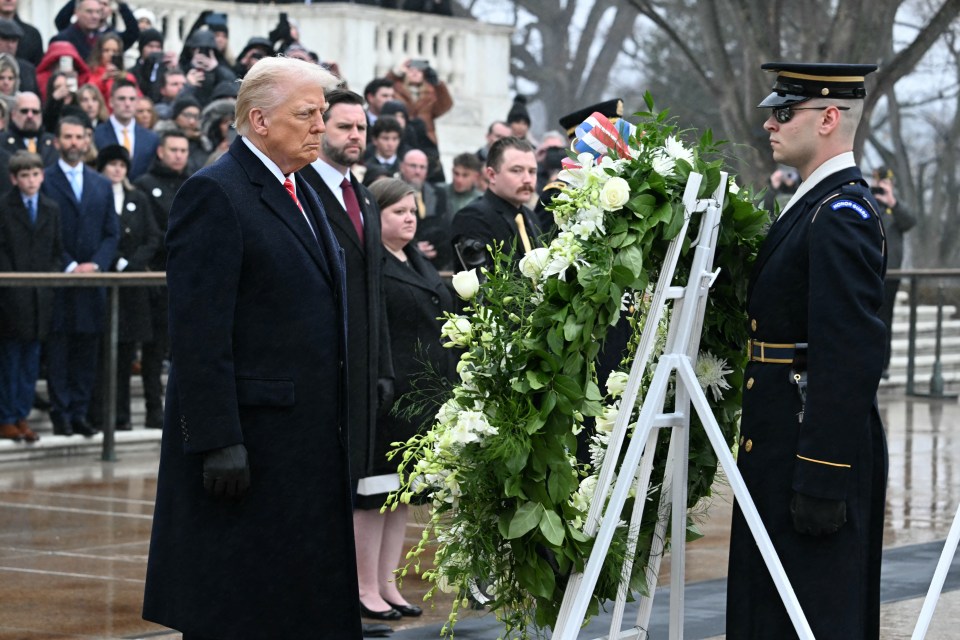 Donald Trump laying a wreath at the Tomb of the Unknown Soldier.