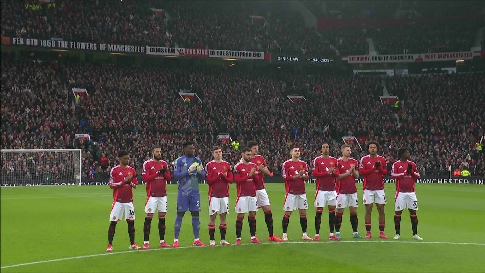 Manchester United players applauding before a match.