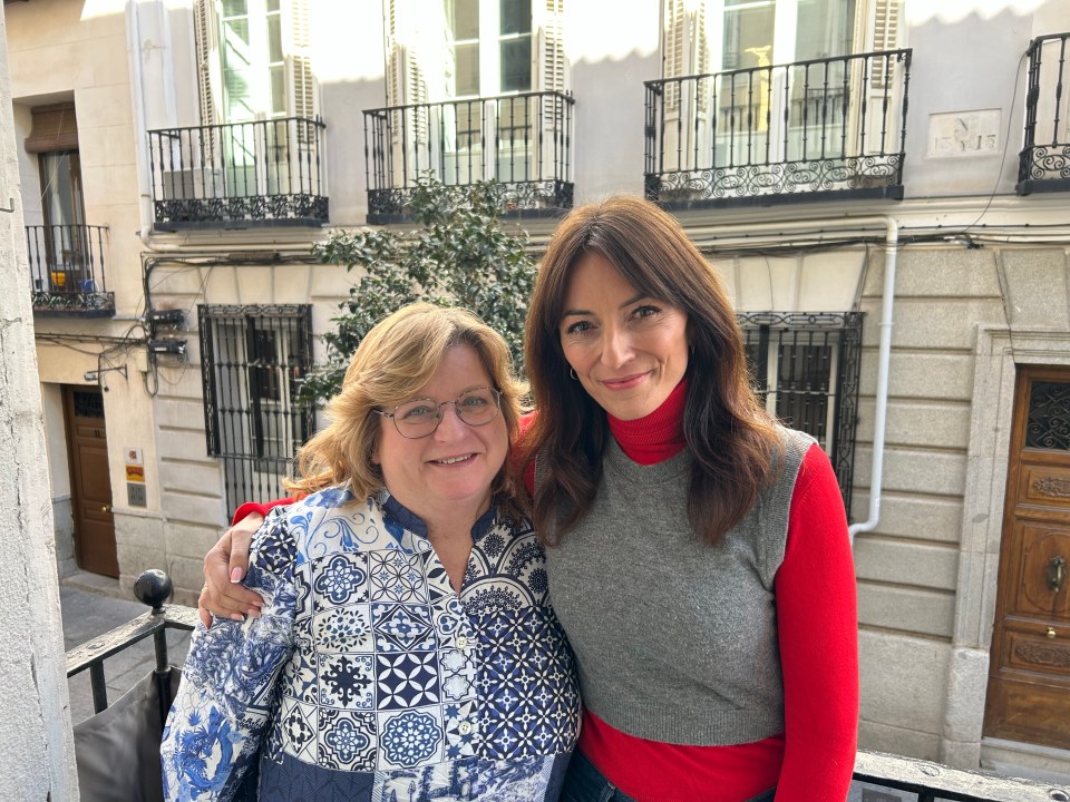 Ruth Appleby and Davina McCall on a balcony.