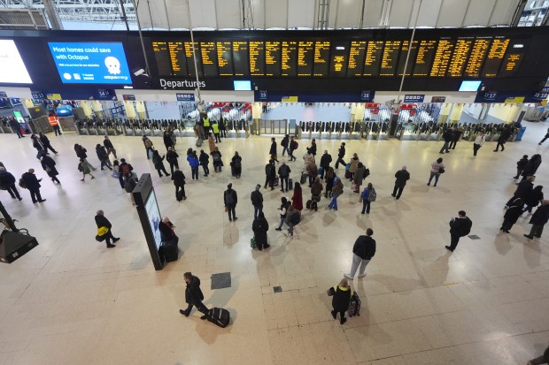 Passengers at Waterloo Station in London.